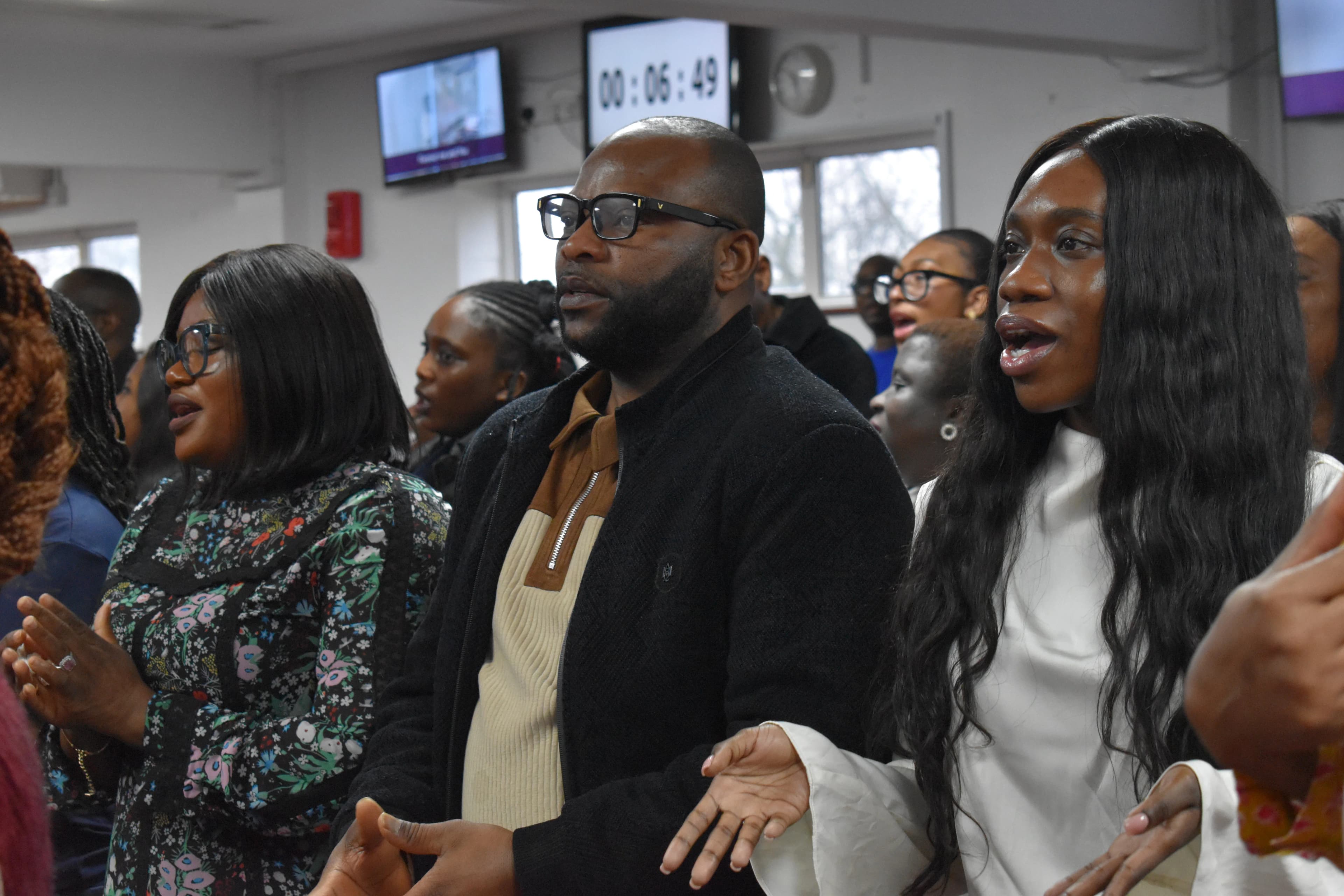 The Praise Tabernacle congregation gathered for worship.